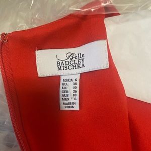 Belle Badgley Mischka Prom Dress. Size 6.  Worn once. It is a Red-Orange color.